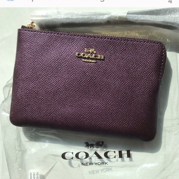 Coach Handbags - NWT Coach Raspberry Zip Wristlet